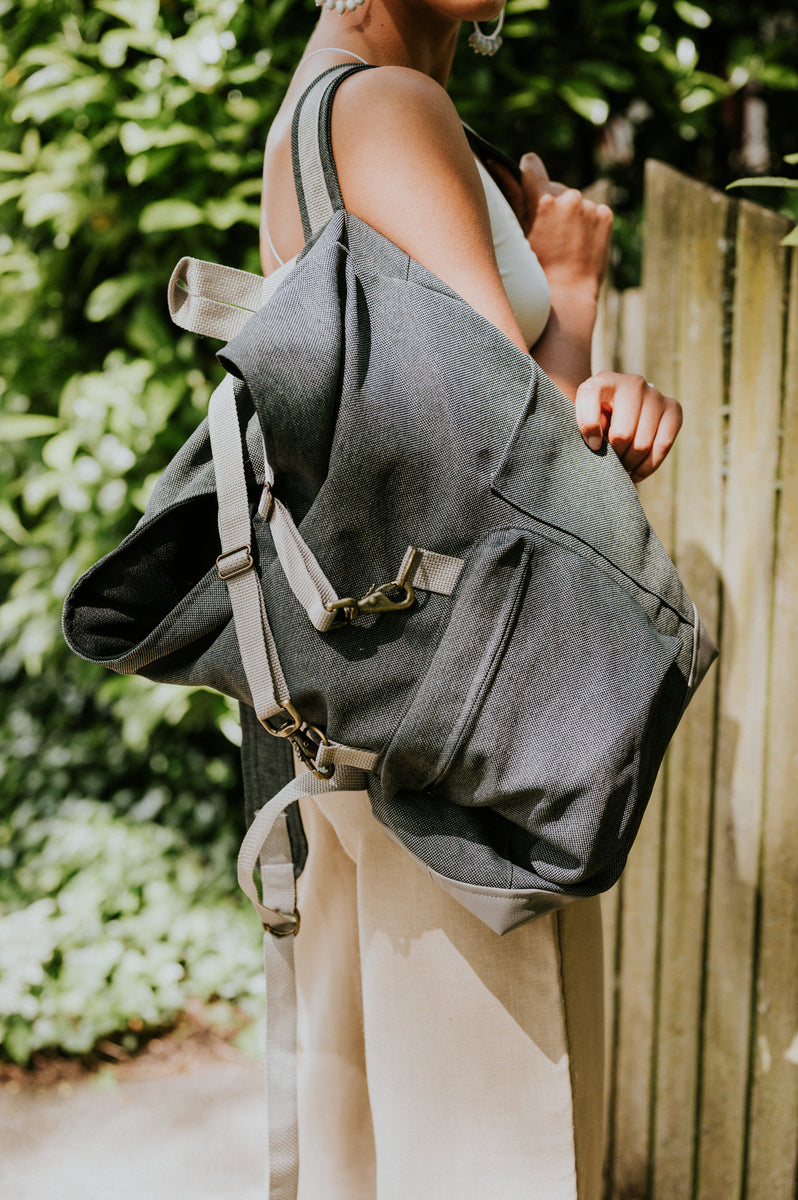 Leather fold sale over backpack